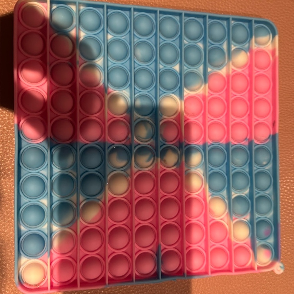 Pink and blue pop it fidget toy
